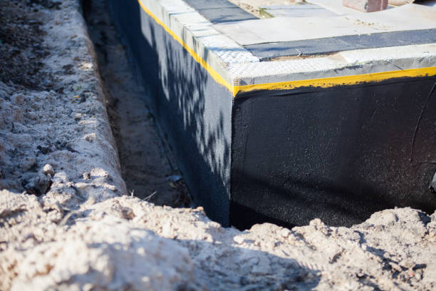 Professional Waterproofing technician working in Seymour, IN